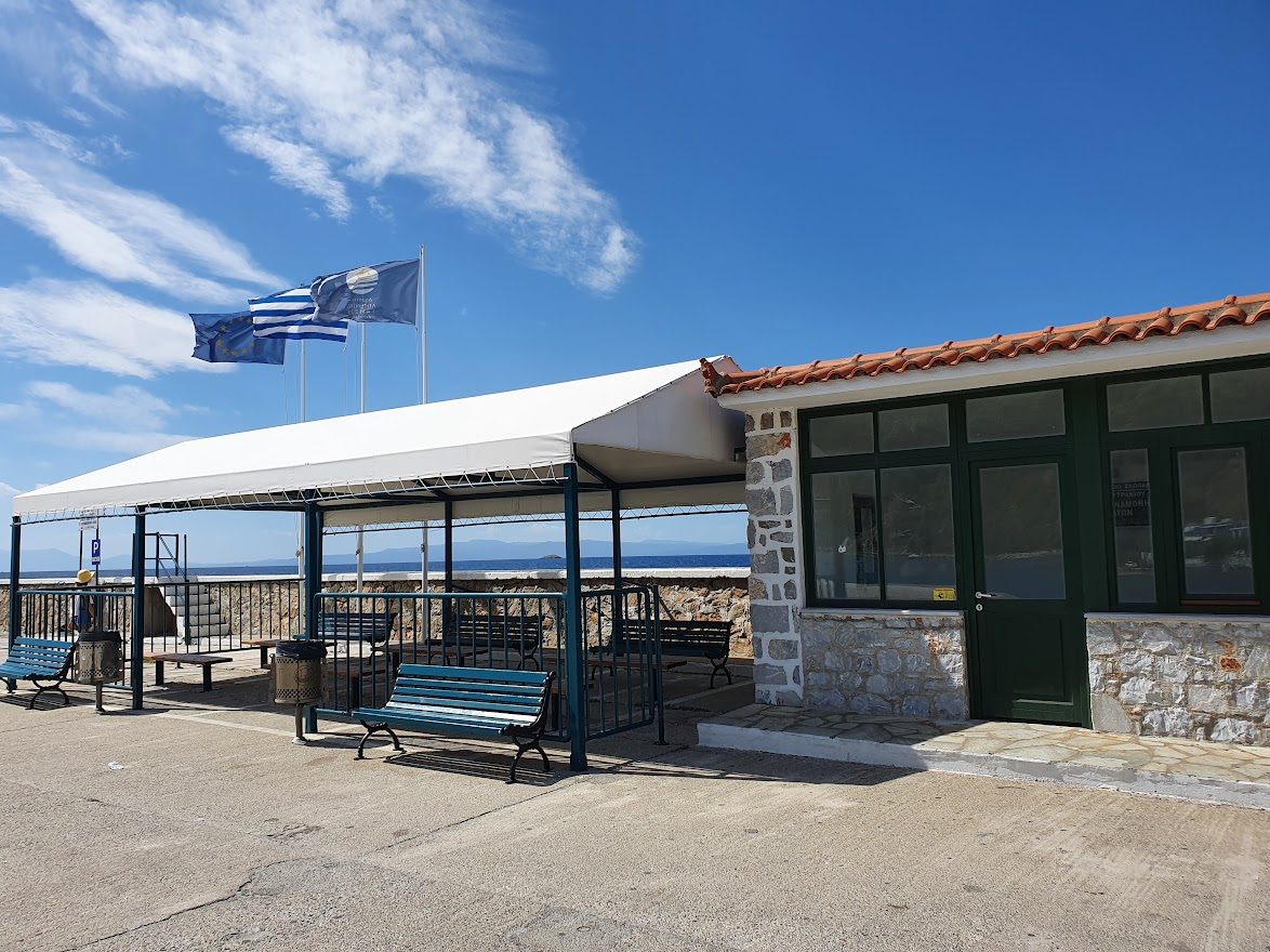 The small covered waiting area at Glossa port in Skopelos island, Greece